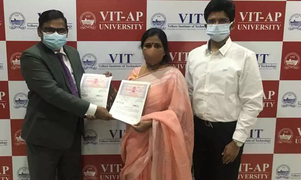 VIT-AP University Vice-Chancellor Dr SV Kota Reddy exchanging the MoU with Sudha Niveditha