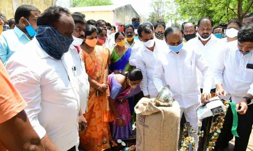 Health Minister Eatala Rajender inaugurating grain purchasing centre at agricultural market yard in Huzurabad on Friday