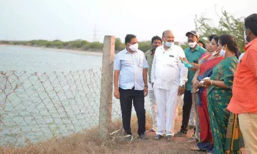 Mayor Sujatha, Deputy Mayor Suryanarayana and others inspecting SS Tanks in Ongole on Friday