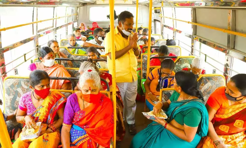 TDP’s Narasimha Yadav requesting ‘fake voters’ in a bus at Korlagunta Road to not to vote in the elections