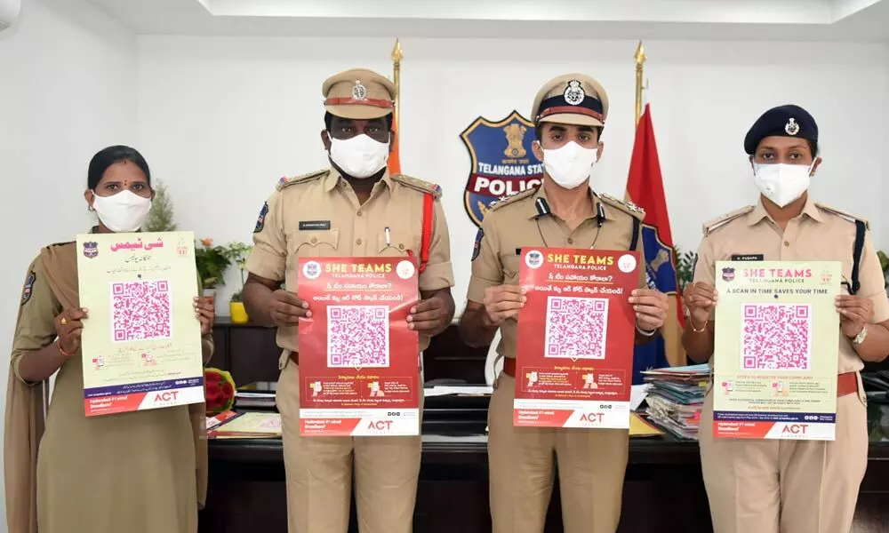 Commissioner of Police Tarun Joshi, Central Zone In-charge DCP Pushpa, She Teams inspector Srinivas Rao and constable Mamatha releases QR Code Complaint posters in Warangal on Saturday