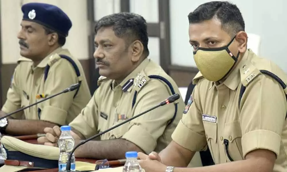 DIG  G Pala Raju (middle) and other officers speaking to the media at the DGP’s office in Mangalagiri on Sunday
