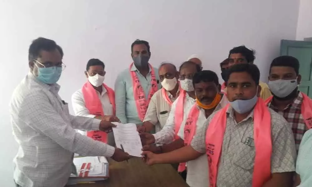 TRS candidate for the byelection of 18th ward of Bodhan Municipality Benjar Gangaram filing his nomination to the Returning Officer in Bodhan on Sunday