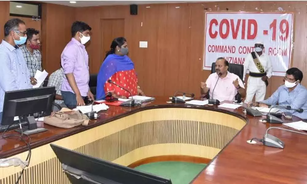 District Collector M Hari Jawaharlal holding a  meeting with officials on steps to check the spread of Covid in Vizianagaram on Monday