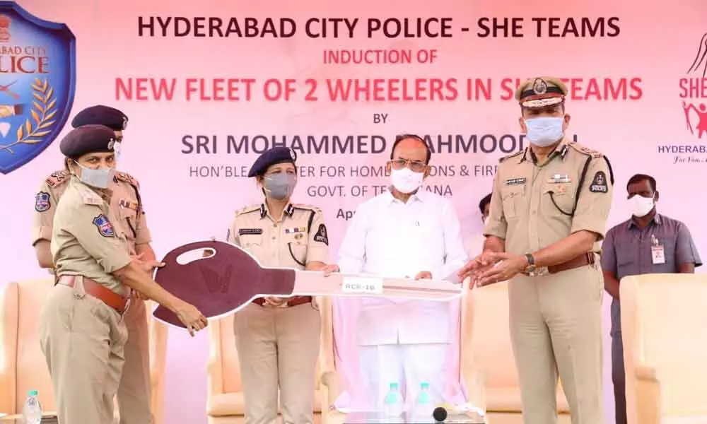 Home Minister Mahmood Ali distributes scooters to She team members