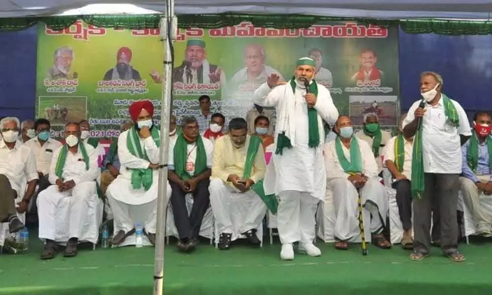 BKU leader Rakesh Singh Tikait speaking at the Maha Panchayat in Ongole on Monday