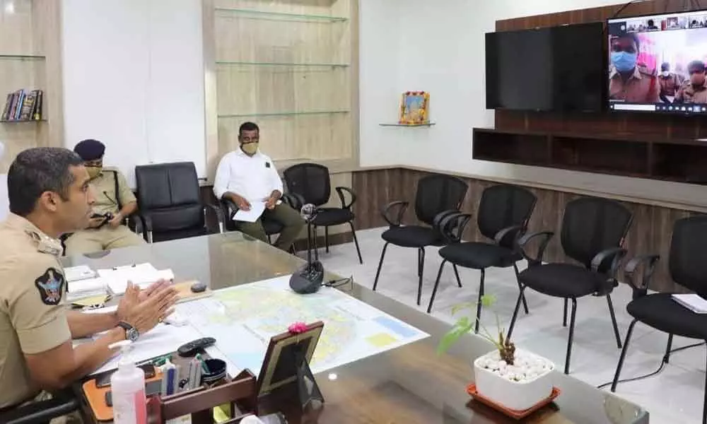 Guntur rural SP Vishal Gunni conducted video conference from DPO with police officials in Guntur city on Monday