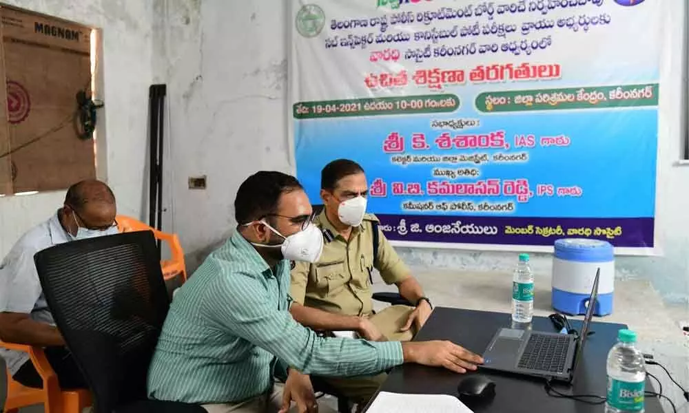 District Collector K Shashanka and Police Commissioner VB Kamalasan Reddy launching free online classes at District Industries Centre in Karimnagar on Monday