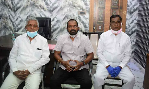 Excise and Prohibition Minister Dr V Srinivas Goud at a meeting with TRS cadre in Kottur on Monday. Shadnagar MLA Anjaiah Yadav also seen