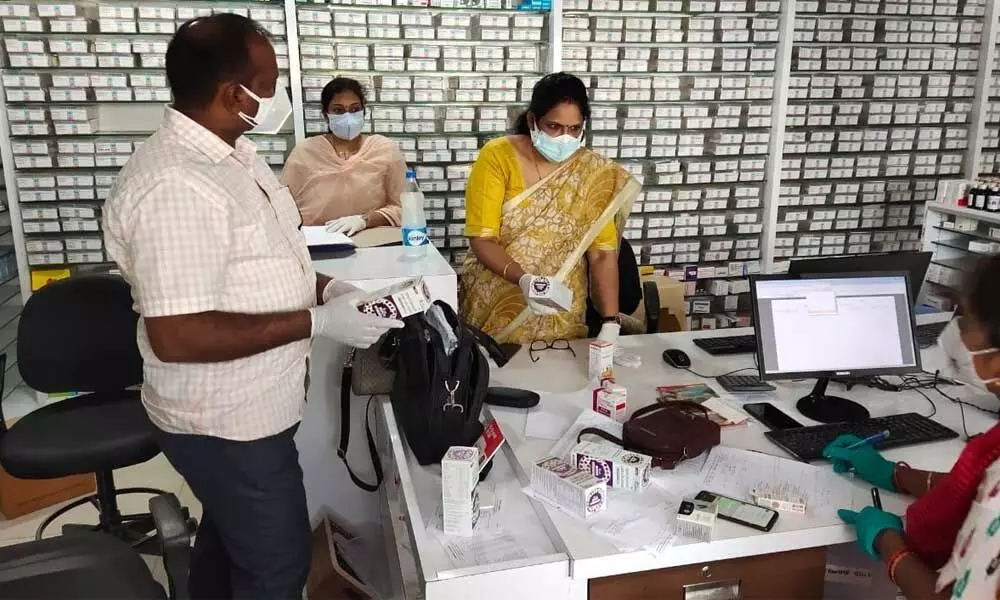The Vigilance team conducting a raid at Central Pharmacy Store in Visakhapatnam on Tuesday