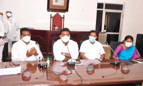 Transport Minister Perni Nani addressing a review meeting with officials at the District Hospital in Machilipatnam on Wednesday