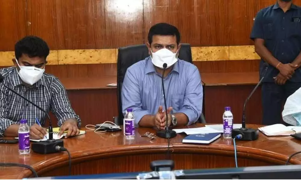 District Collector V Vinay Chand at a review meeting with officials in Visakhapatnam on Thursday