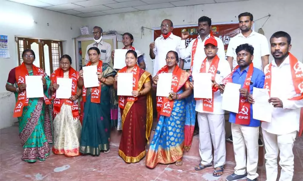 CPM candidates in fray for the GWMC polls with the partys Warangal Urban district secretary Sarampally Vasudeva Reddy in Warangal on Thursday