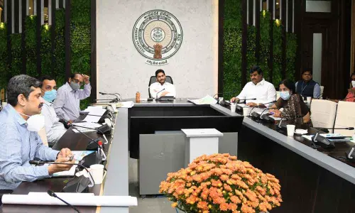 Chief Minister Y S Jagan Mohan Reddy reviewing YSR Jagananna Saswatha Bhoomi Hakku-Bhoo Rakshana scheme at his camp office on Thursday
