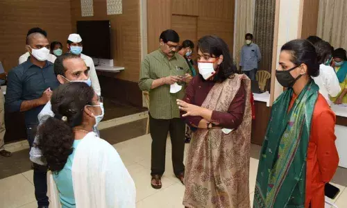 Joint Collector Keerthi Chekuri inspecting the Covid-19 Command Control Centre along with Assistant Collector Geetanjali Sharma in Kakinada on Thursday
