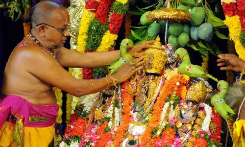 Priests performing Pattabhishekam to Lord Rama at Sri Sita Ramachandra Swamy temple in Bhadrachalam on Thursday