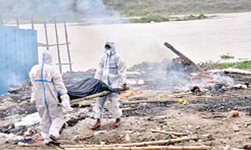 Overburdened crematorium staff throw up hands as bodies pile up