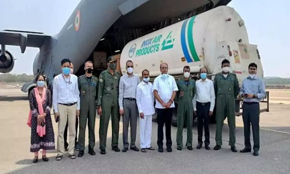 Health Minister Eatala Rajender, CS Somesh Kumar supervised the army aircraft airlifting the oxygen trucks.