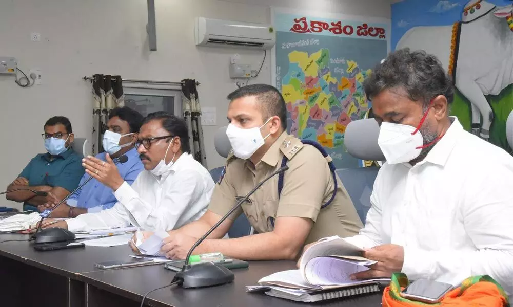 Collector Dr Pola Bhaskara conducting a meeting with the officials on containment operations in Ongole on Friday