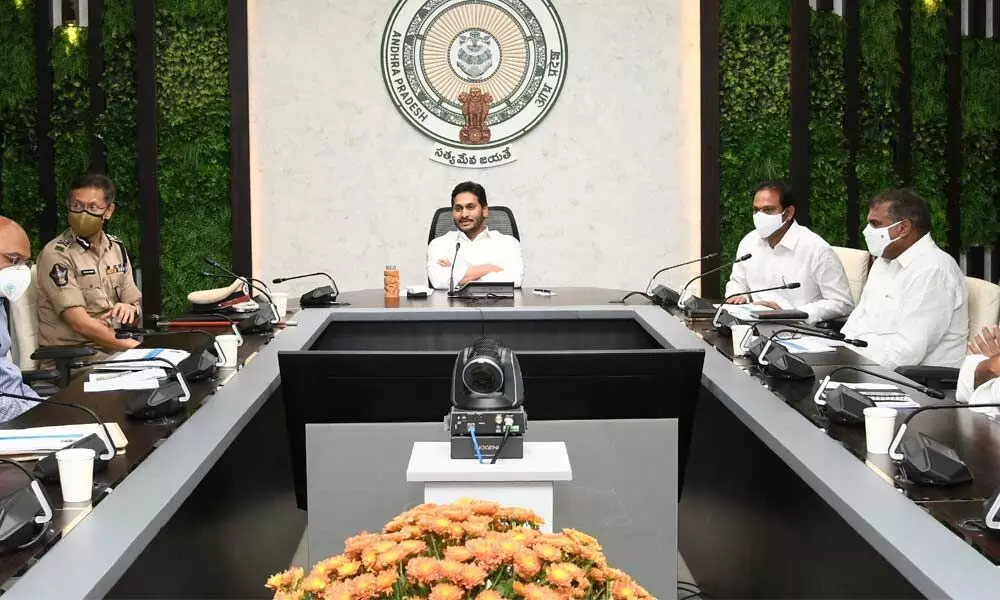 Chief Minister YS Jagan Mohan Reddy takes part in a high-level review on Covid-19 situation at his camp office on Friday