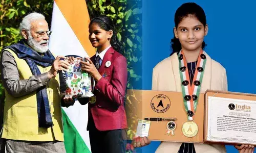 File photo of Sharanya Mudundi receiving a gift from Prime Minister Narendra Modi