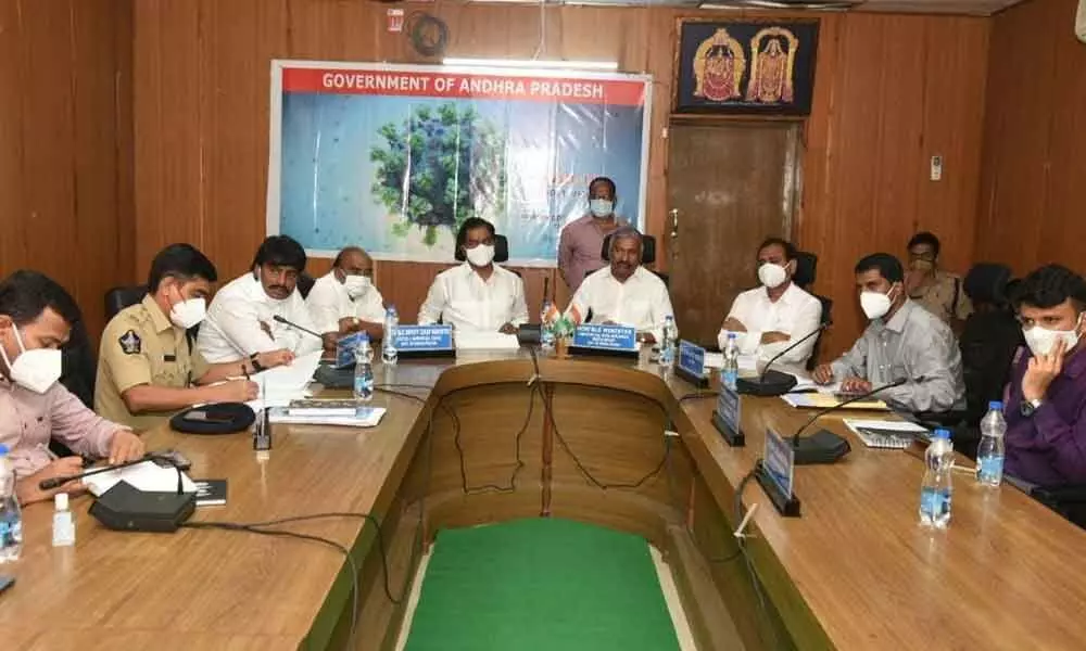 Deputy CM K Narayana Swamy, Minister P Ramachandra Reddy and others at the Covid task force meeting in Tirupati on Sunday