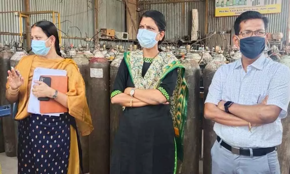 Joint Collectors AS Dinesh Kumar and P Prasanti visiting medical oxygen supplying companies at Autonagar in Guntur on Sunday