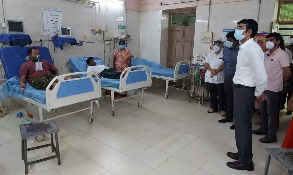 Collector DM Reddy interacting with Covid patients in government headquarters hospital in Rajamahendravaram on Sunday