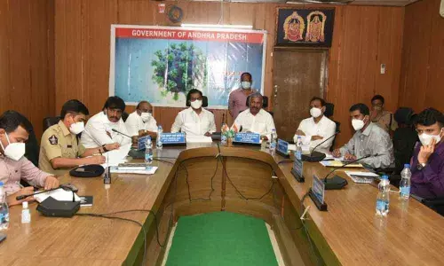 Deputy CM K Narayana Swamy, Minister P Ramachandra Reddy and others at the Covid task force meeting in Tirupati on Sunday