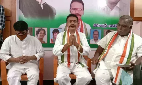 City Congress president  B Muralidhar speaking to reporters in  Rajamahendravaram on Sunday