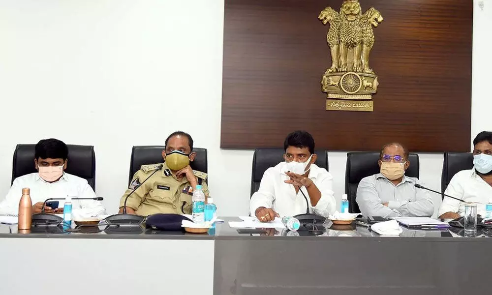 Minister Perni Nani addressing meeting of MLAs and officials to review Covid cases in Vijayawada on Monday