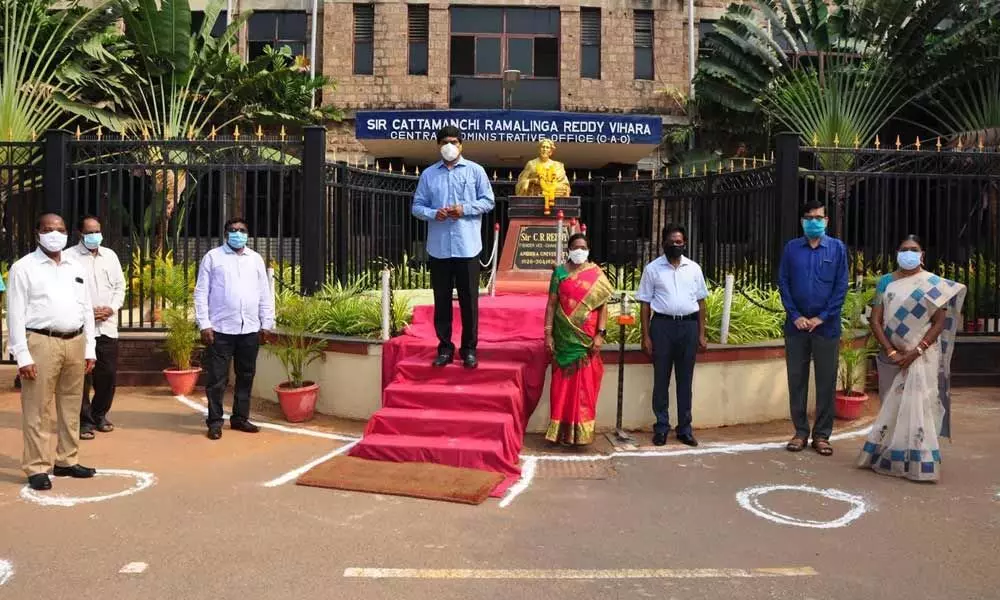 Andhra University Vice-Chancellor P V G D Prasad Reddy paying tributes to C R Reddy statue at AU campus on the occasion of its Foundation Day in Visakhapatnam on Monday