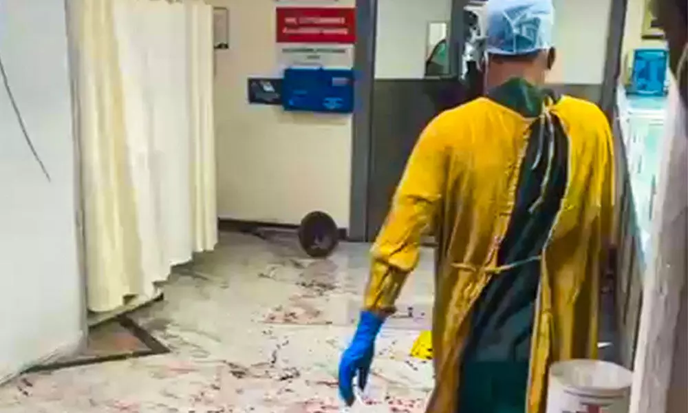 Blood stained floor of a ward after violence