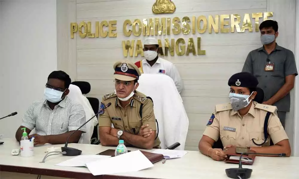 Commissioner of Police Tarun Joshi speaking to media in Warangal Commissionerate on Wednesday. Urban district Collector Rajeev Gandhi Hanumanthu (left) is also seen