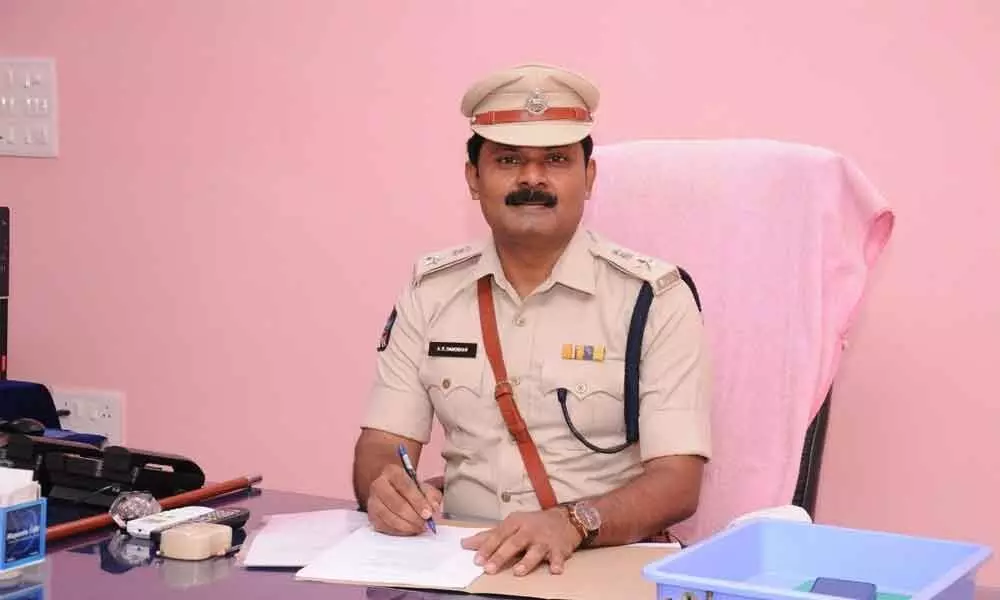 AR Damodar, SP taking charge as 28th principal of Police Training College in Ongole on Wednesday