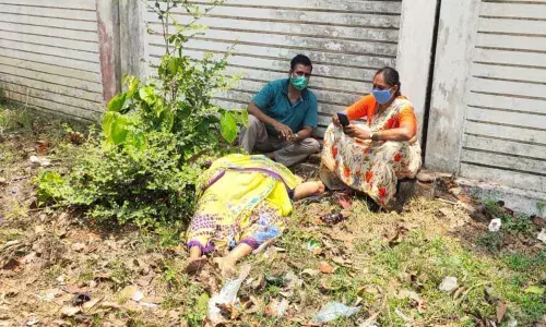 The body of woman with relatives in front of a private hospital in Rajam.