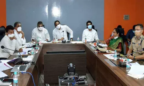 Health Minister Alla Nani, Finance Minister B Rajendranath Reddy and others taking part in the Cabinet Sub-Committee meeting on measures to be taken to contain Covid in Mangalagiri on Wednesday