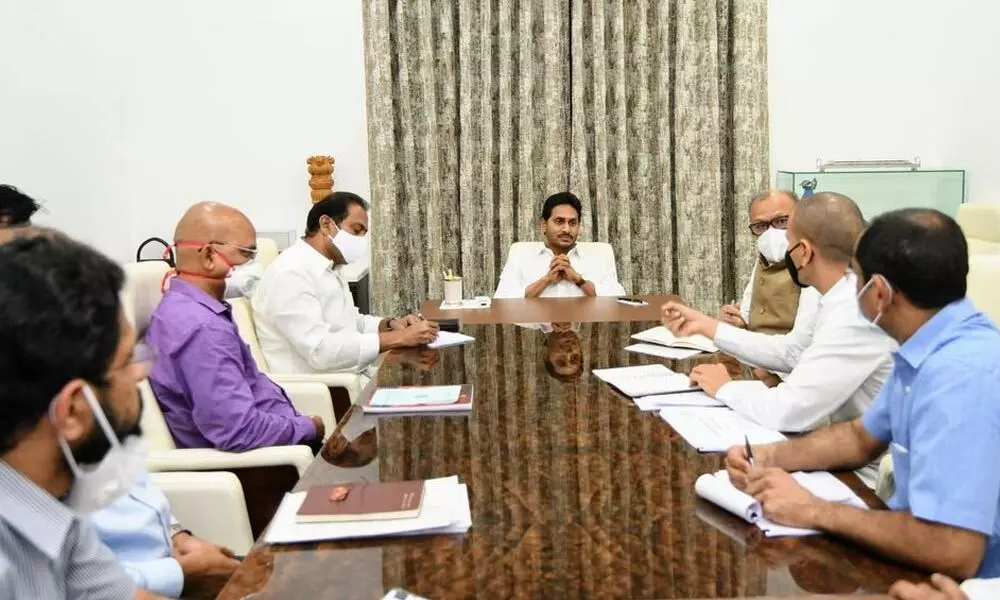 Chief Minster Y S Jagan Mohan Reddy reviews Covid-19 control and prevention measures at his camp office in Tadepalli on Thursday