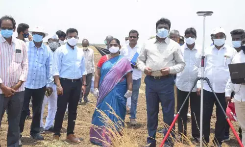 Prakasam Joint Collector JV Murali inspecting the comprehensive resurvey under YSR Jagananna Saswatha Bhuhakku  Bhuraksha programme at Malleswara Puram of Ongole mandal on Thursday