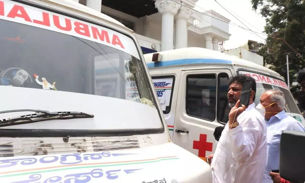 KPCC president DK Shiva Kumar launches an ambulance service under Congress Cares in Bengaluru on Friday