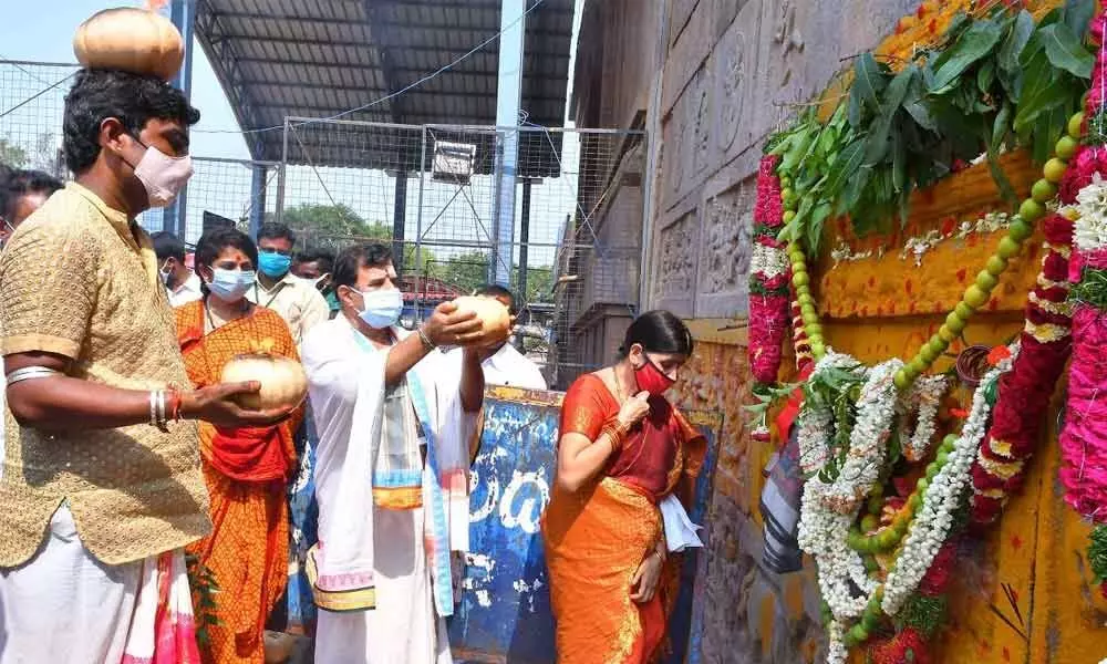 Executive Officer (EO) K S Rama Rao and others taking part in Kumbhotsavam at Srisailam temple on Friday