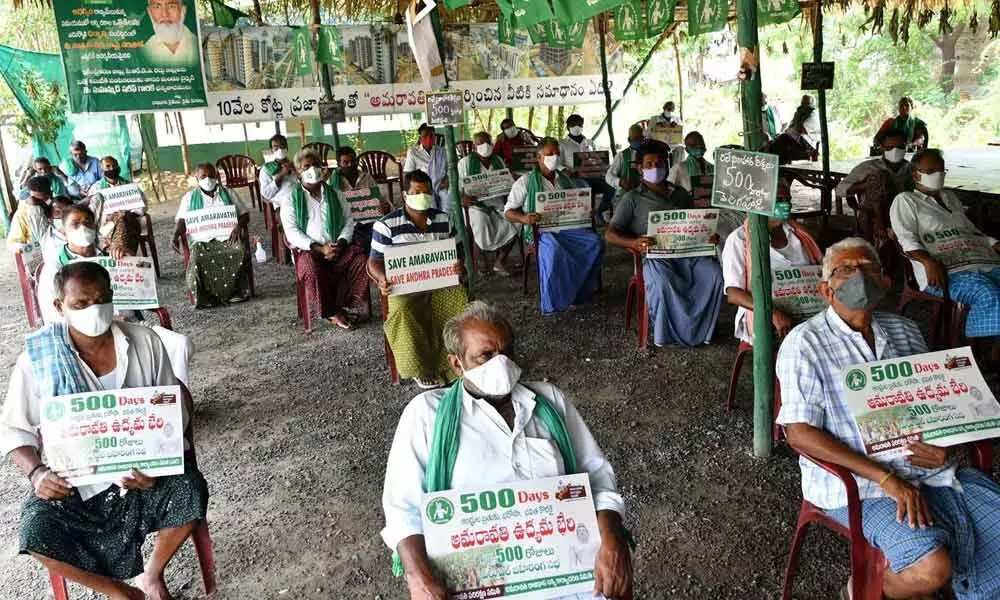 Amaravati capital regiona farmers take part in a protest marking the completion of 500 days at Velagapudi on Friday