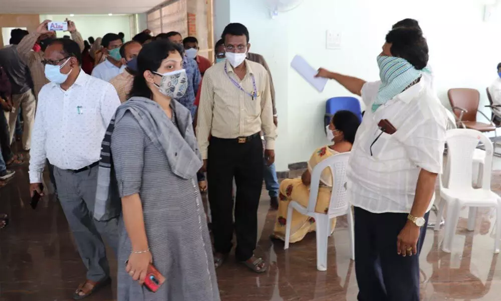 Municipal Commissioner Pamela Satpathy inspecting the Covid-19 tests in Warangal on Saturday