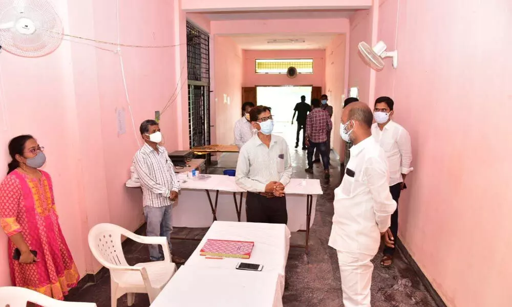 BJP state president Bandi Sanjay Kumar inspecting the Covid-19 isolation ward at a sports school in Karimnagar on Saturday.