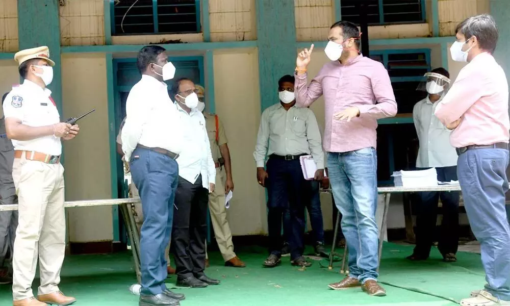 District Collector RV Karnan at the counting centre at SR&BGNR College in Khamman on Saturday