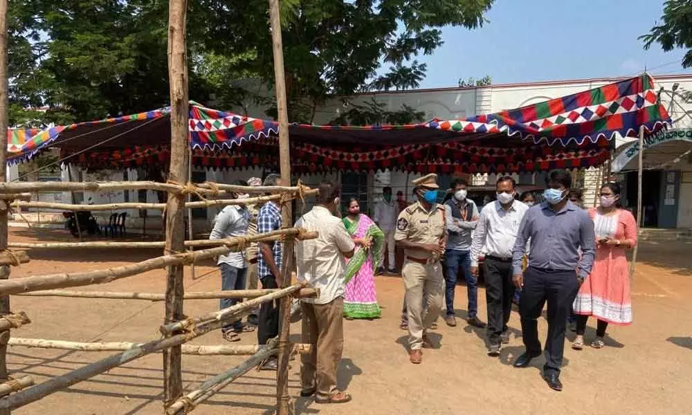 Municipal Commissioner Abishikt Kishore inspecting arrangements at the training college Covid vaccination centre in Rajamahendravaram on Sunday