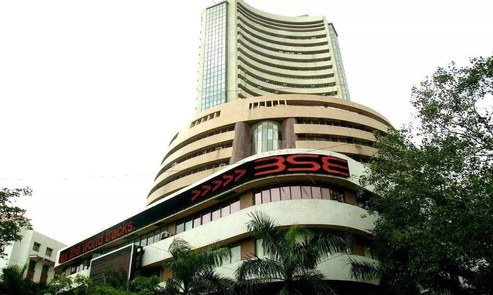 Sensex, Nifty edge up in range-bound trading