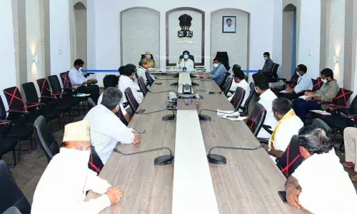 District Collector D Muralidhar Reddy addressing religious heads in Kakinada on Monday