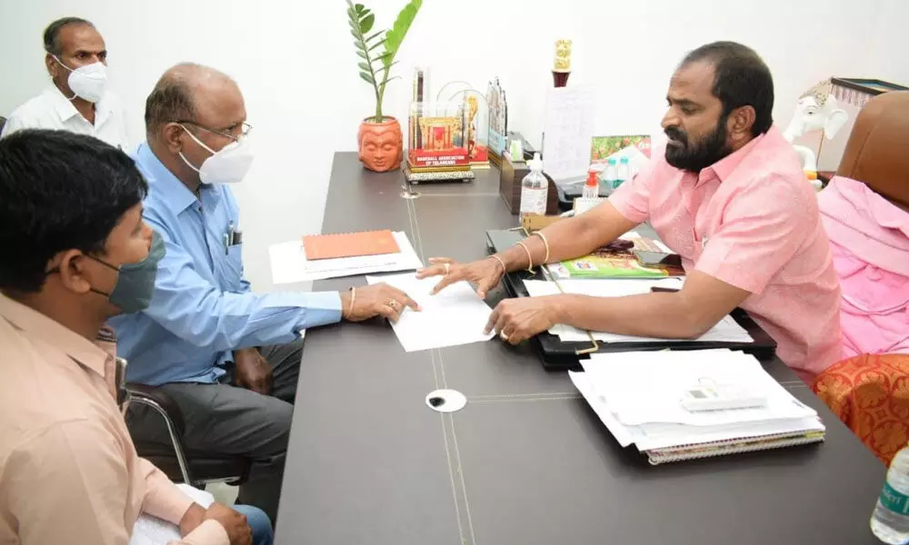 Excise Minister Srinivas Goud reviewing the works of Appannapally flyover bridge with the officials in Mahbubnagar on Tuesday