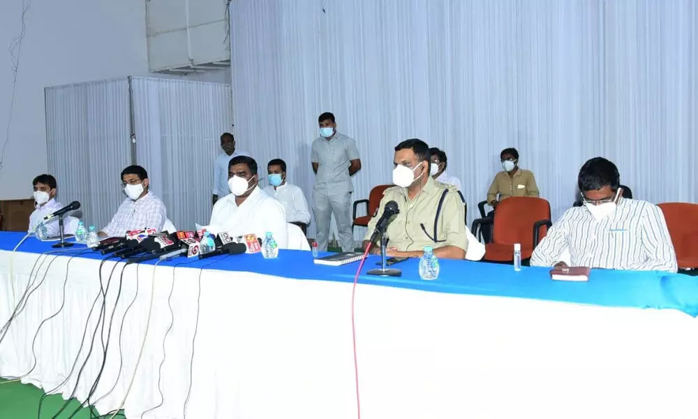 District Collector G Veera Pandiyan along with SP Dr Fakkeerappa Kaginelli addressing media conference at Sunaina Auditorium in Kurnool on Wednesday.